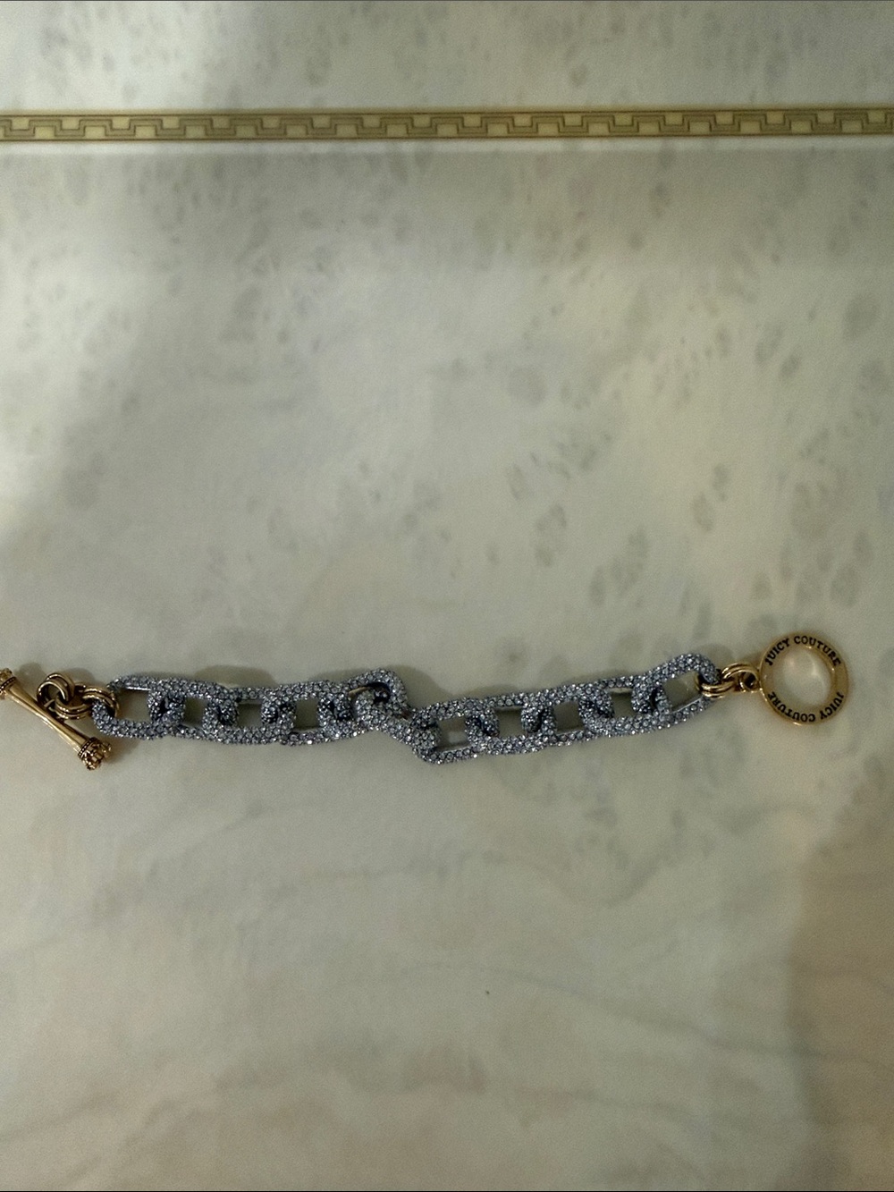 Juicy Couture Silver Crystal Link Bracelet with Gold Logo Ring